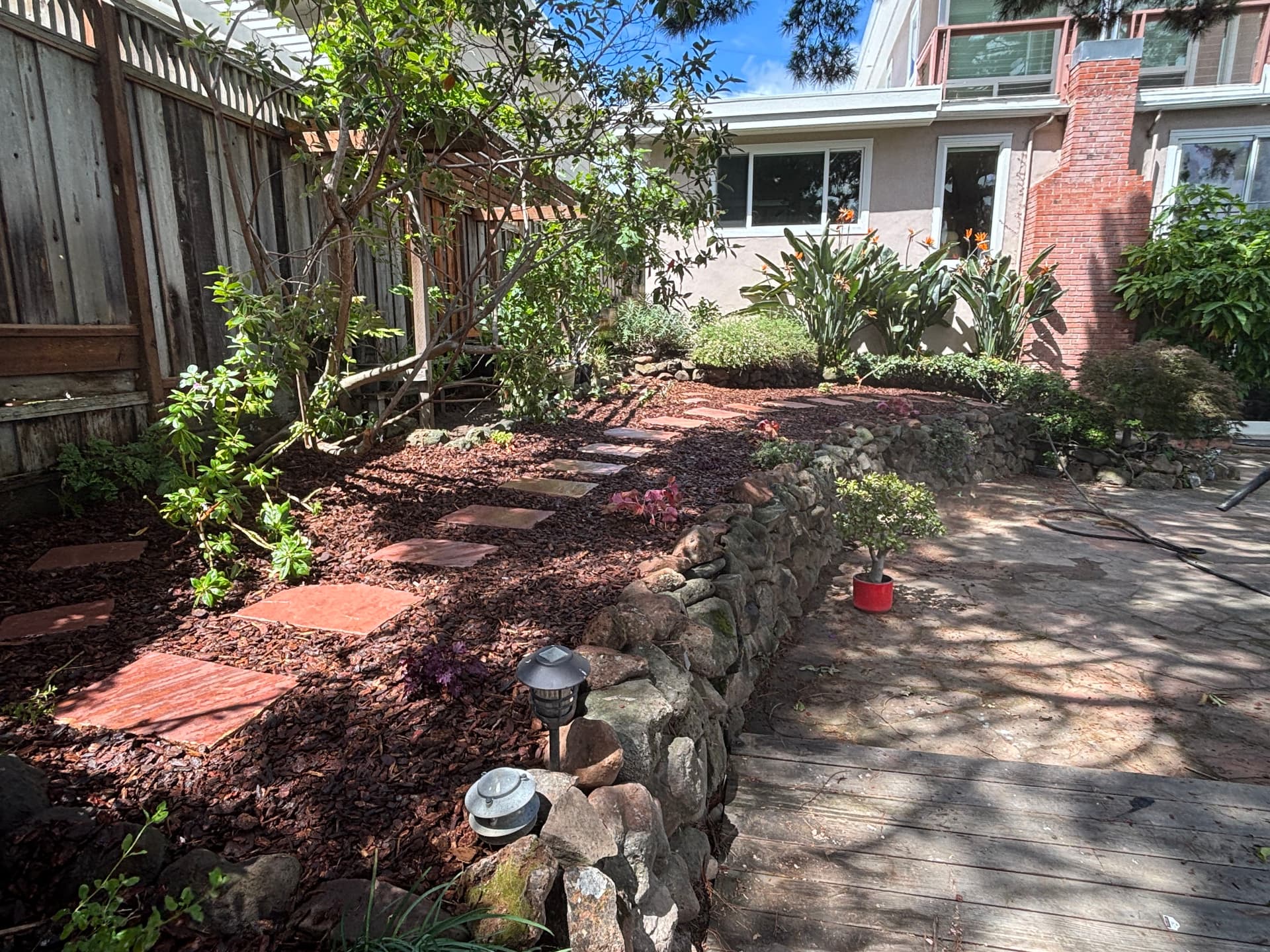 Gallery photos for Garden Overhaul With Flagstone Path New Mulch and Irrigation: Image #2