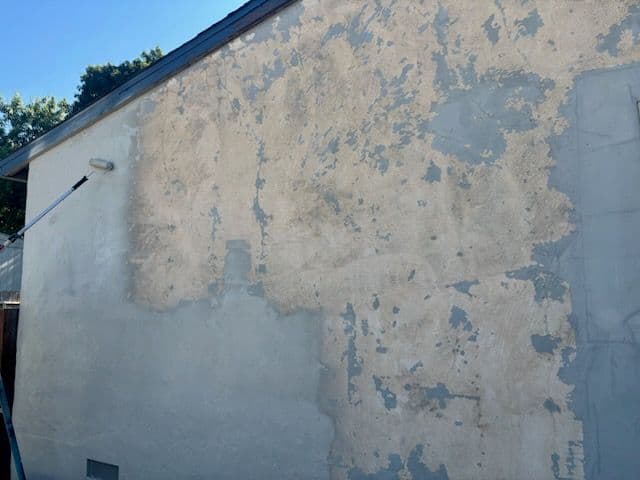 Transforming Peeling Walls with Fresh Paint image
